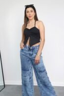 Jean importado Atenea en denim rígido tono degradé con bolsillos laterales.