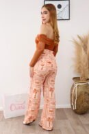 Pantalón Coral estampado en lino, silueta ajustada con bolsillos traseros. Tallas S y M.