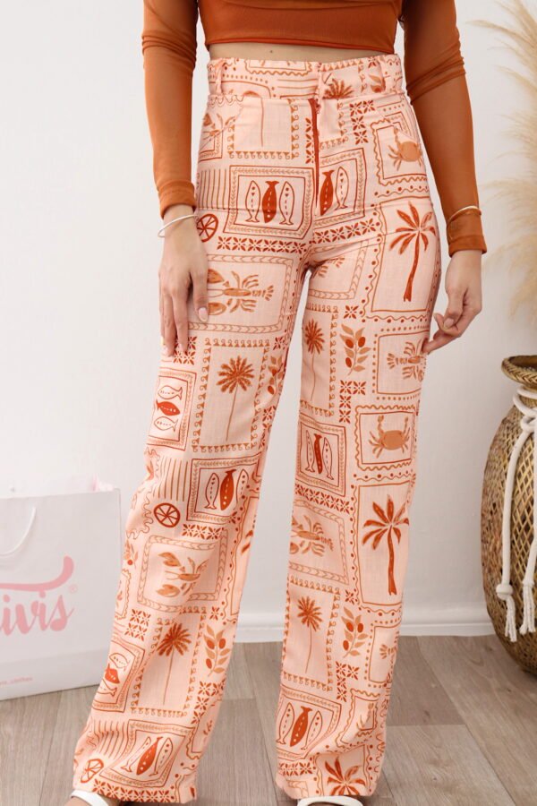 Pantalón Coral estampado en lino, silueta ajustada con bolsillos traseros. Tallas S y M.
