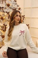 Buzo oversize de algodón en talla única con estampado y cuello redondo.