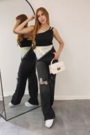 Jean Inglaterra gris humo con desgastes y tiro alto. Tallas 6 a 14.